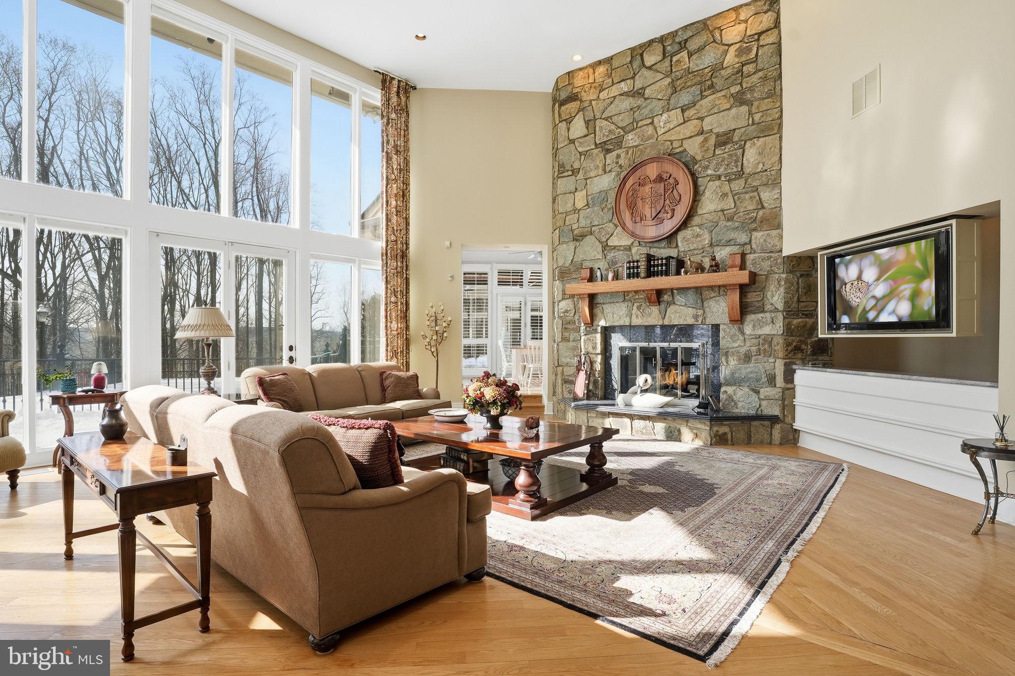 11940 River Road Potomac, MD 20854 - Photo 9 of 69 Great Room has Retractable TV