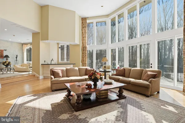 a view of a living room and dining room