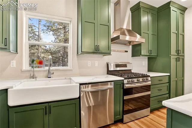 a kitchen with a sink stove and cabinets