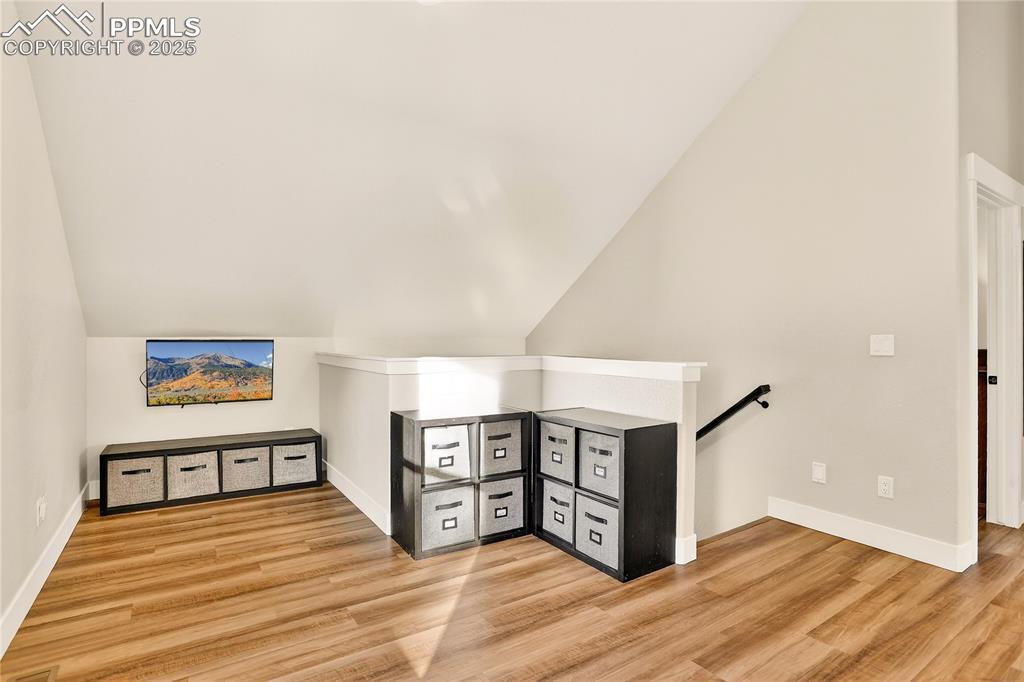 9920 Hodgen Road Colorado Springs, CO 80908 - Photo 26 of 49 a view of a livingroom with wooden floor