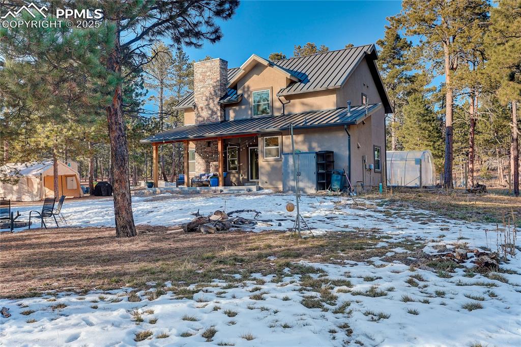 9920 Hodgen Road Colorado Springs, CO 80908 - Photo 5 of 49 a front view of a building with street