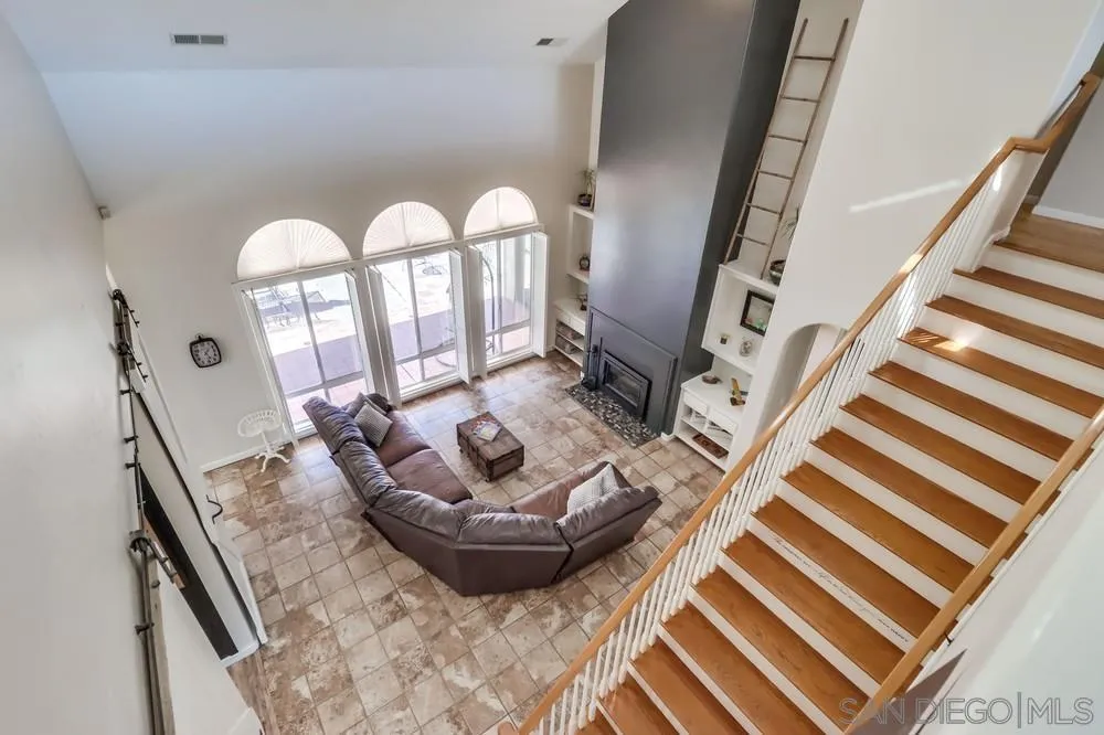 15735 Lawson Valley Road Jamul, CA 91935 - Photo 14 of 37 a room with furniture and a chandelier