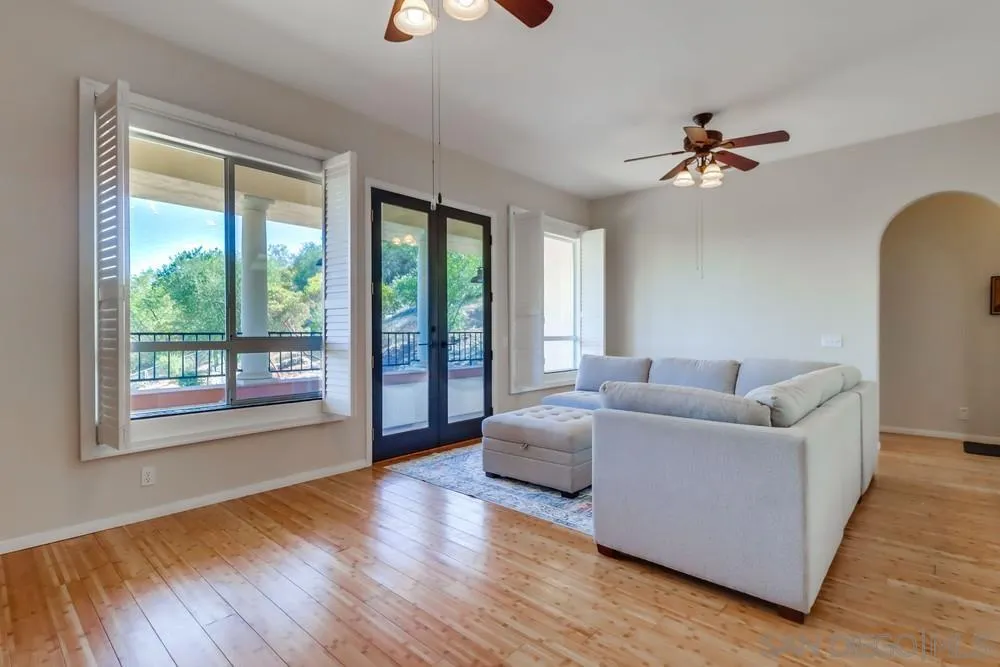 15735 Lawson Valley Road Jamul, CA 91935 - Photo 20 of 37 a living room with furniture and a large window