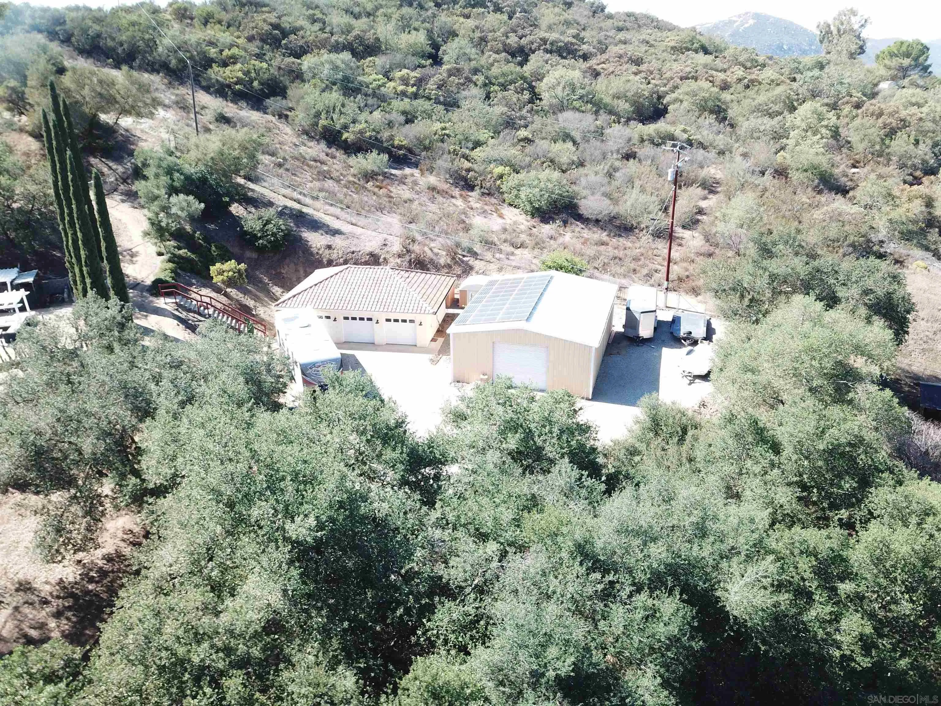 15735 Lawson Valley Road Jamul, CA 91935 - Photo 35 of 37 an aerial view of residential house with outdoor space