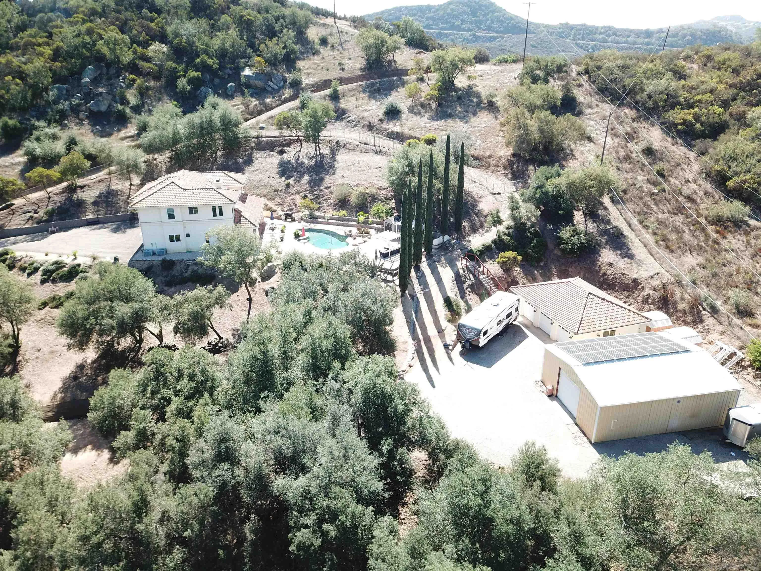 15735 Lawson Valley Road Jamul, CA 91935 - Photo 36 of 37 an aerial view of a house with yard