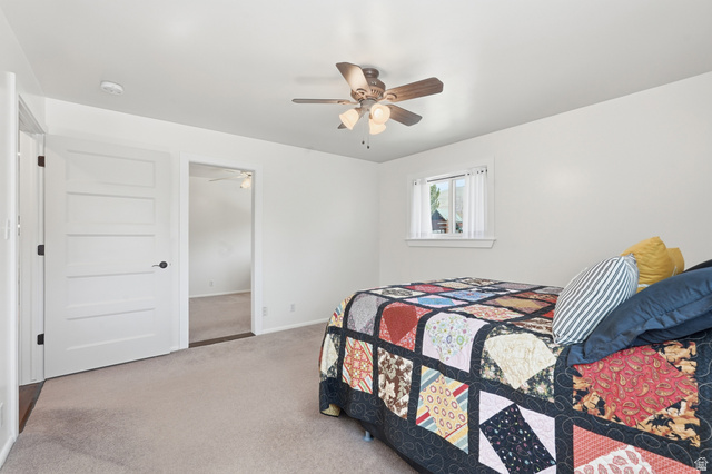 2420 West Old Hwy Road Morgan, UT 84050 - Photo 22 of 54 Bedroom with carpet and ceiling fan