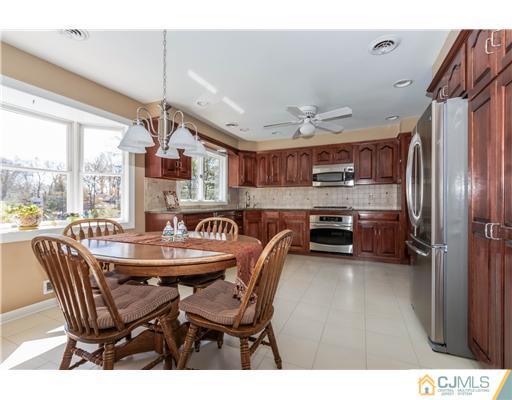19 Moraine Road Edison, NJ 08820 - Photo 9 of 25 a dining room with furniture and window