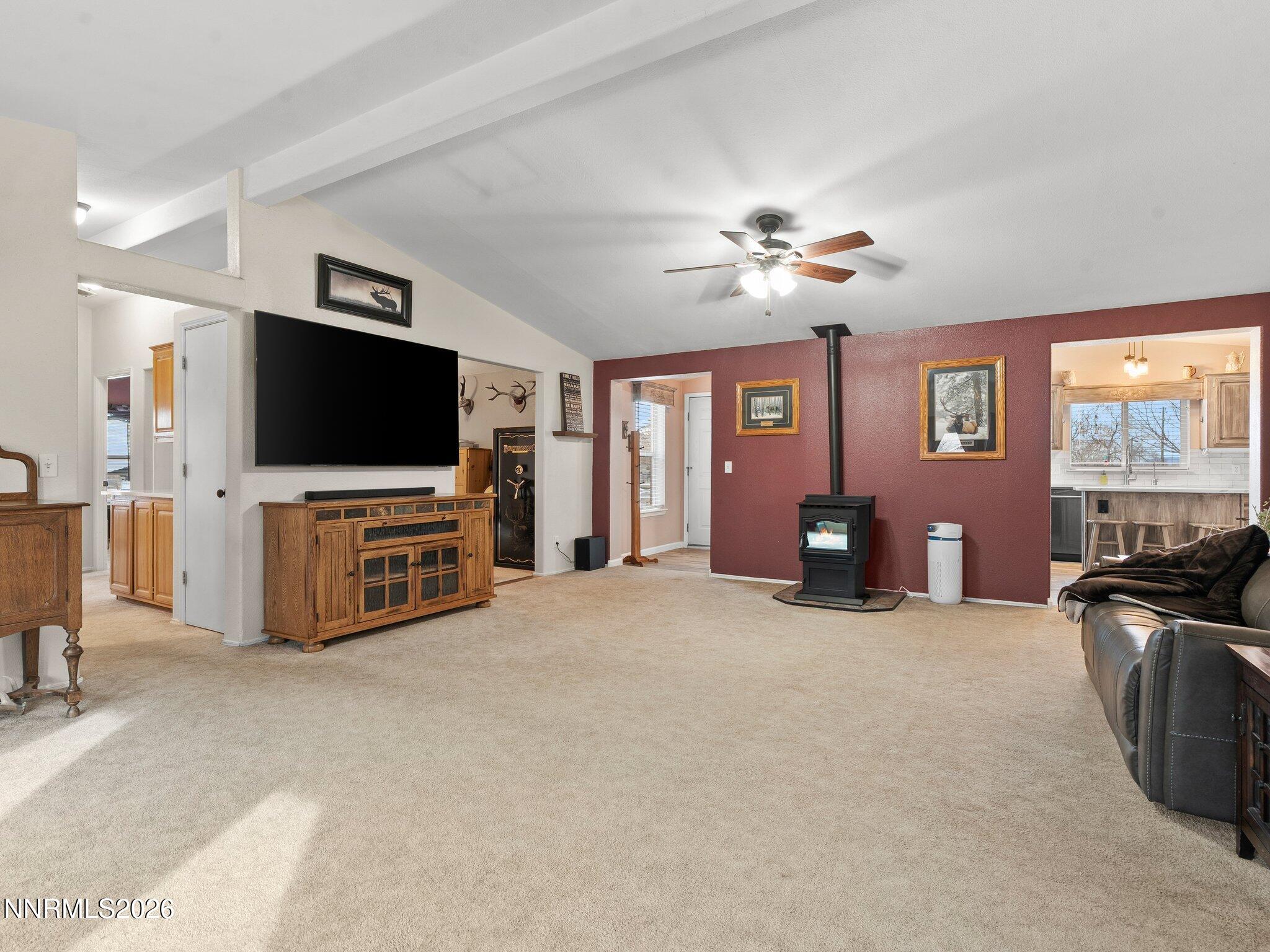 1125 Truckee Lane Fernley, NV 89408 - Photo 16 of 33 a living room with furniture and a flat screen tv