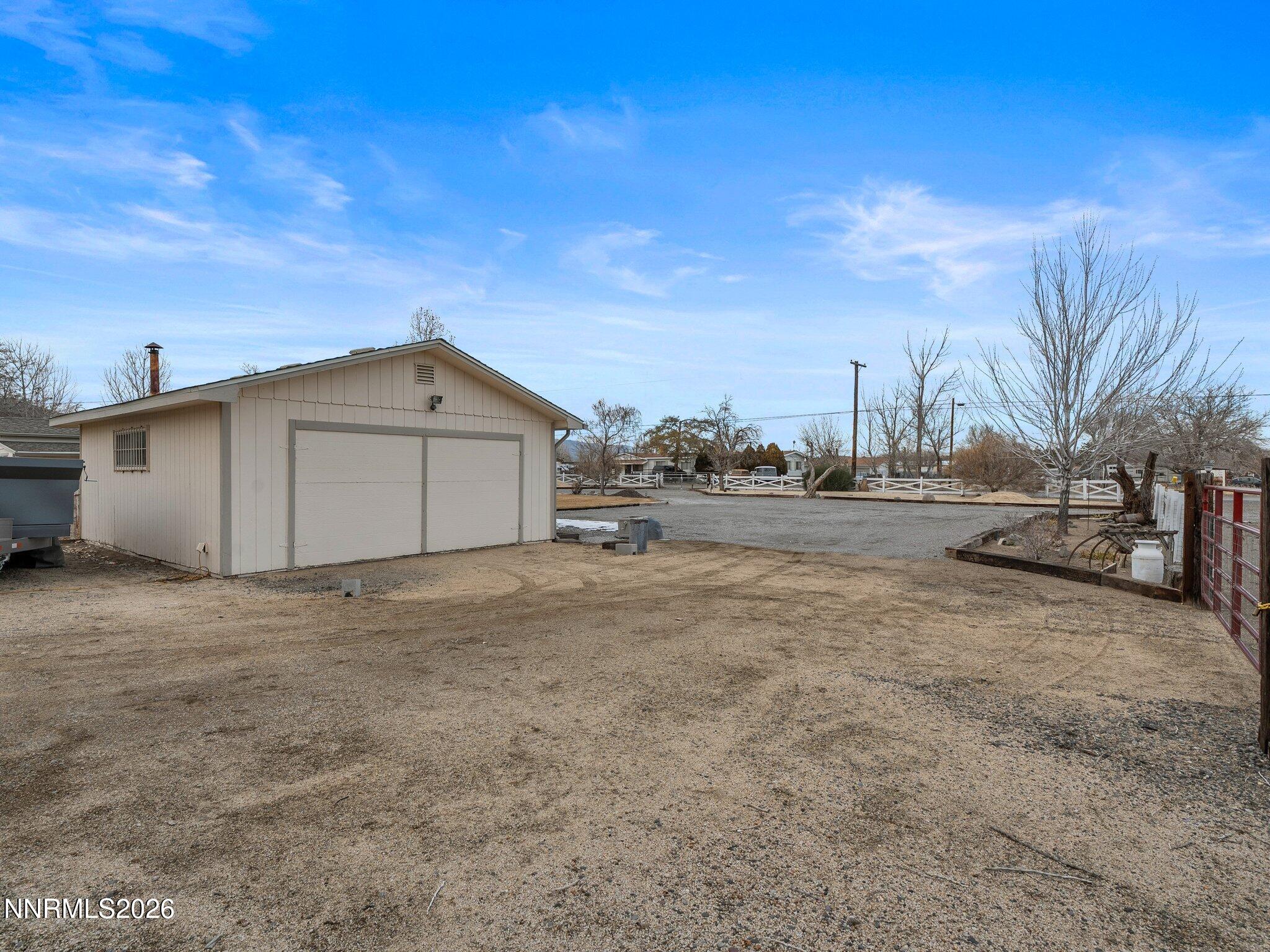 1125 Truckee Lane Fernley, NV 89408 - Photo 25 of 33 a view of garage and yard