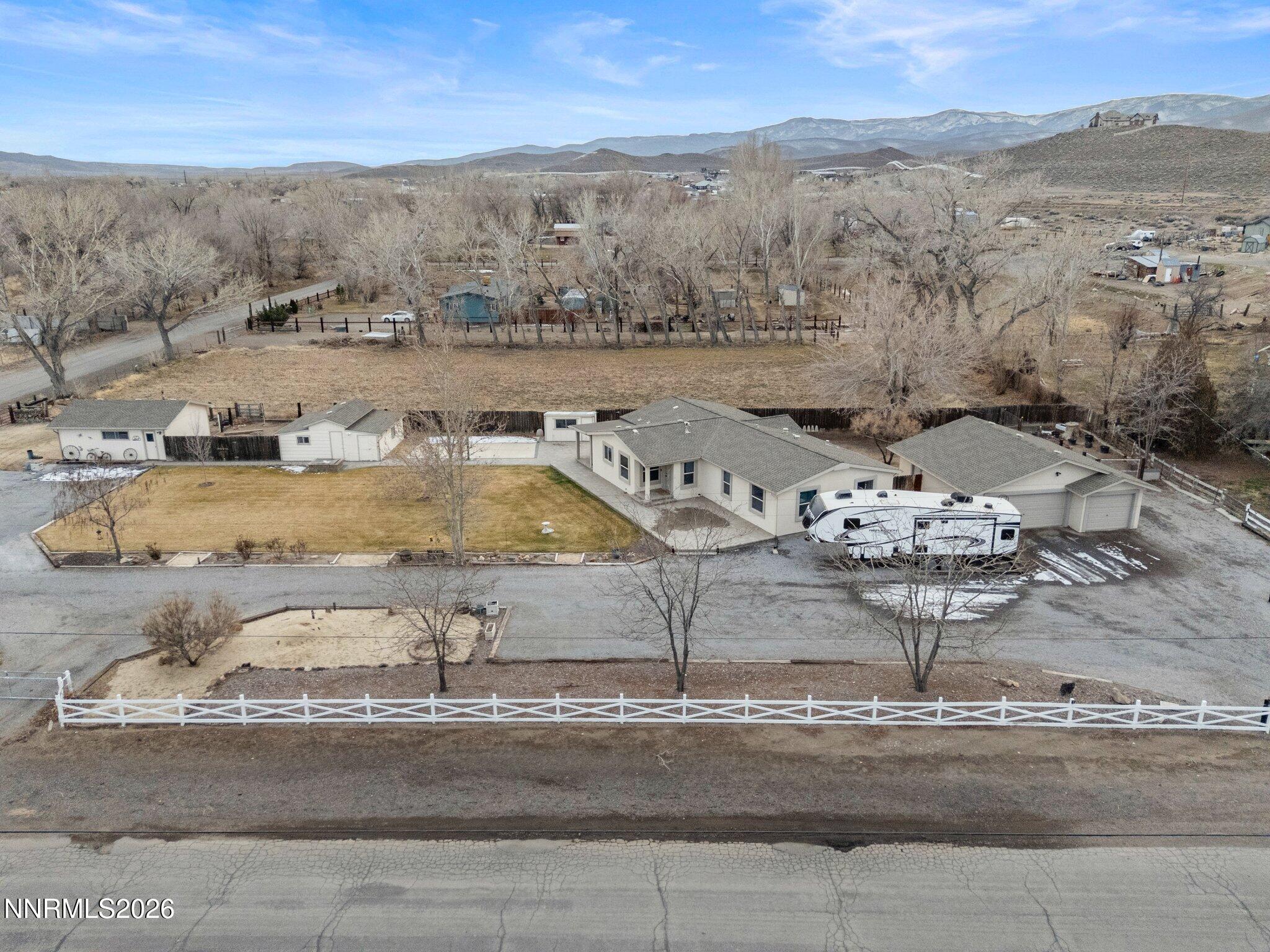 1125 Truckee Lane Fernley, NV 89408 - Photo 26 of 33 an aerial view of a residential houses with outdoor space