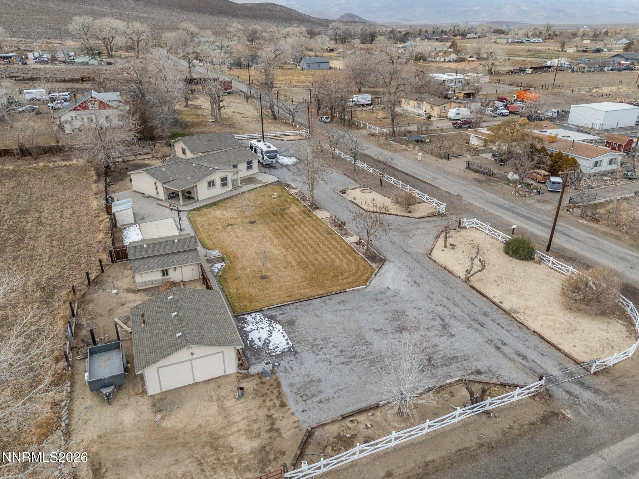 1125 Truckee Lane Fernley, NV 89408 - Photo 29 of 33 an aerial view of a house with a yard