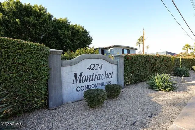 a sign on the side of a road