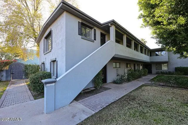 a front view of a house with yard