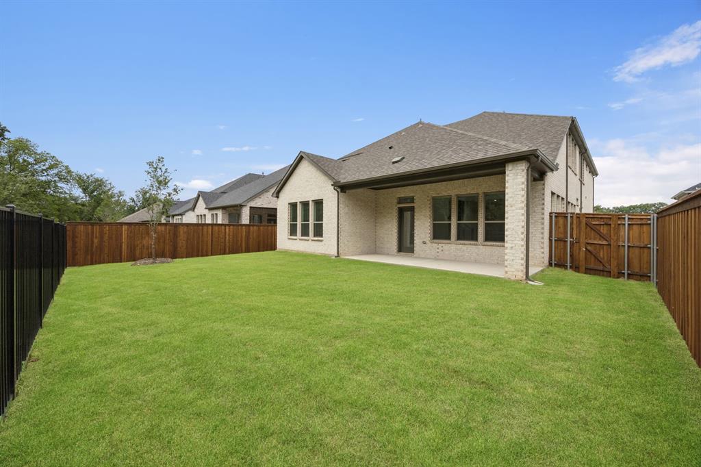 1904 Palmetto Road Celina, TX 75009 - Photo 33 of 33 Covered Patio in the Monet II home plan by Trophy Signature Homes – REPRESENTATIVE PHOTO