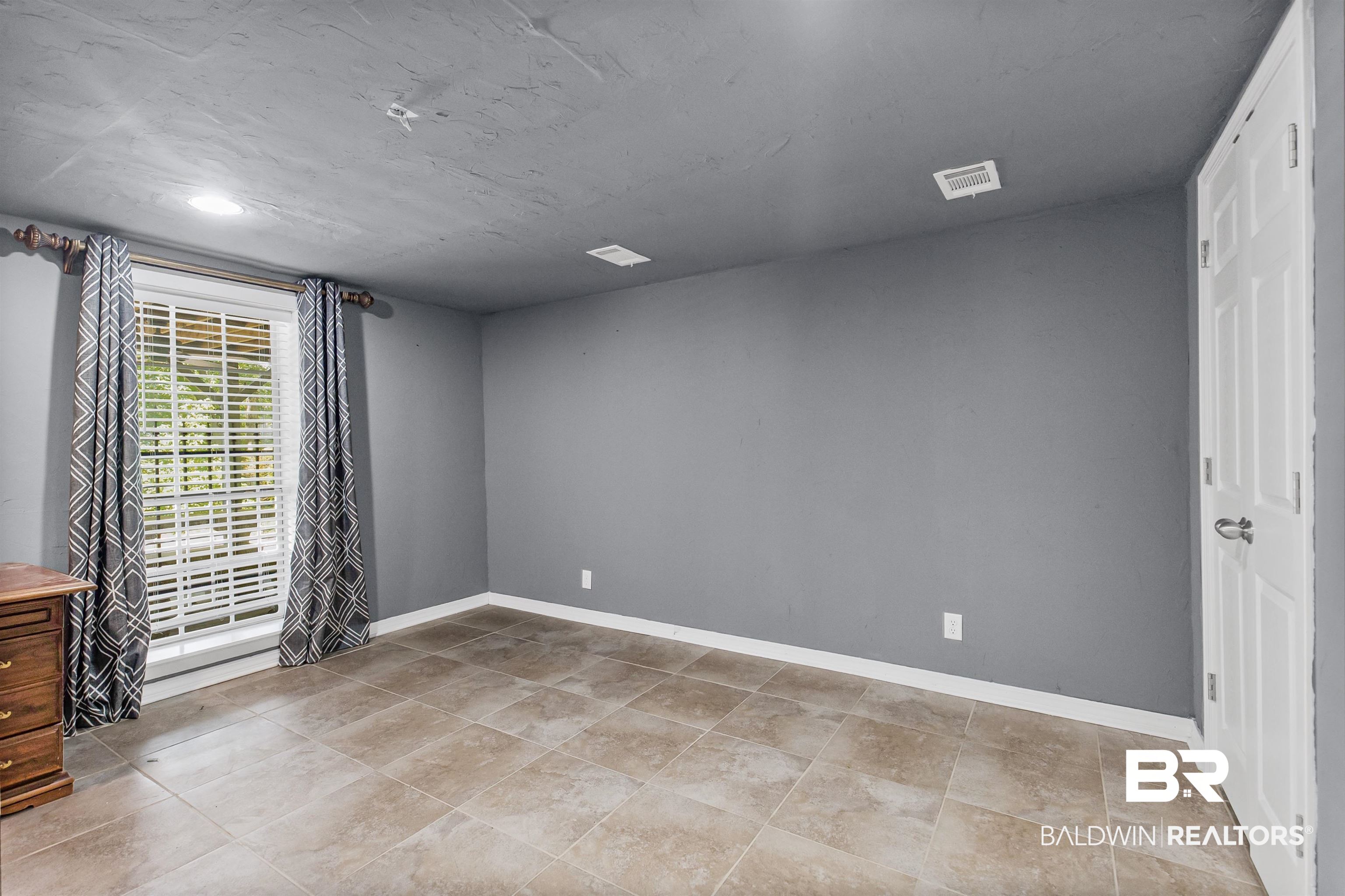 36 Ridgeview Drive Mobile, AL 36611 - Photo 13 of 20 Unfurnished bedroom with baseboards