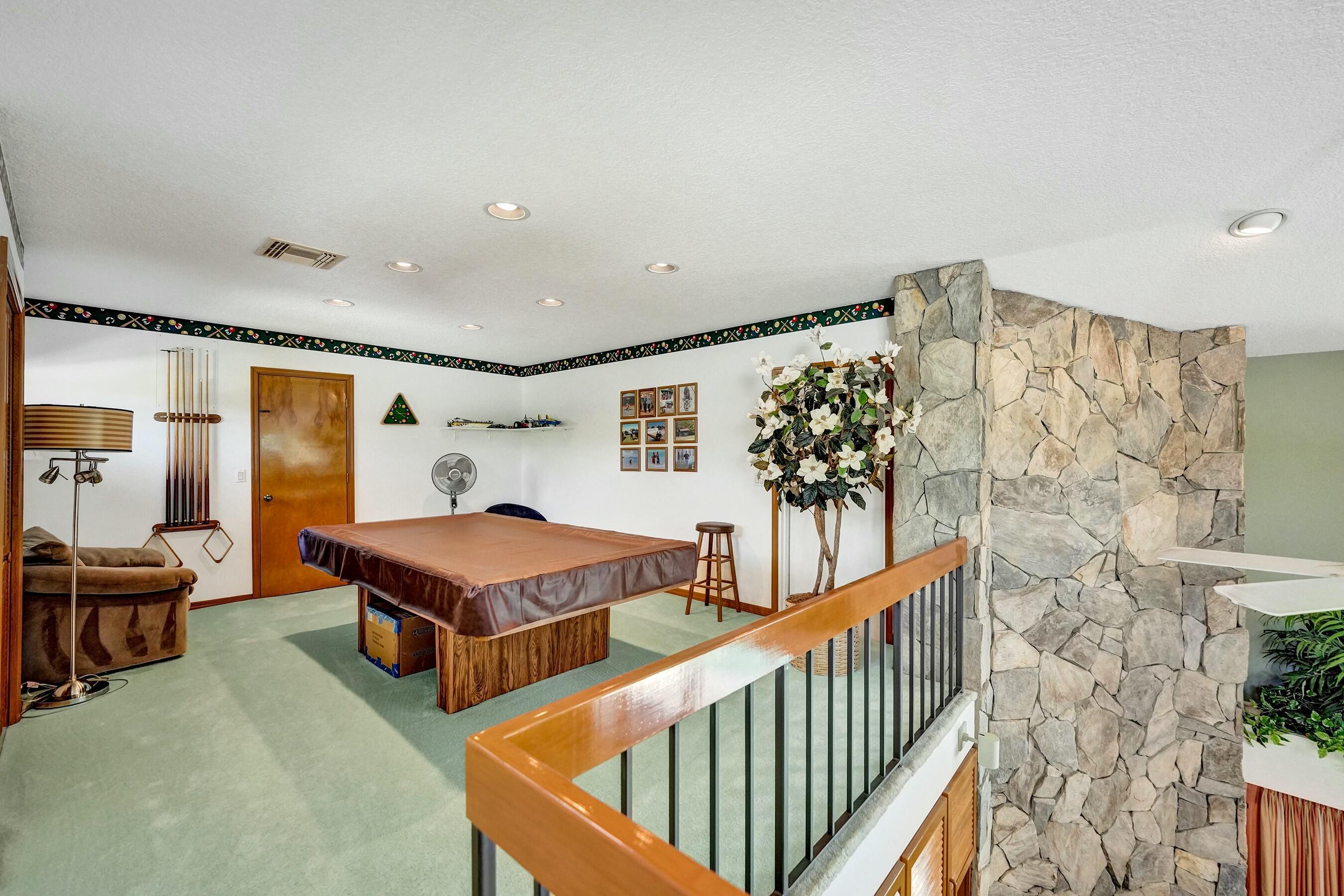 3120 Southeast Downwinds Road Jupiter, FL 33478 - Photo 23 of 33 a living room with furniture