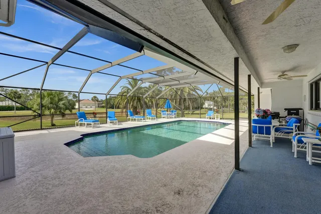 a view of a swimming pool with a porch