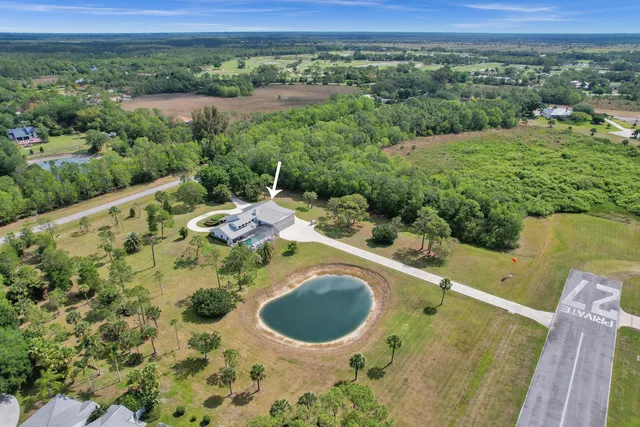 a view of a swimming pool and mountains