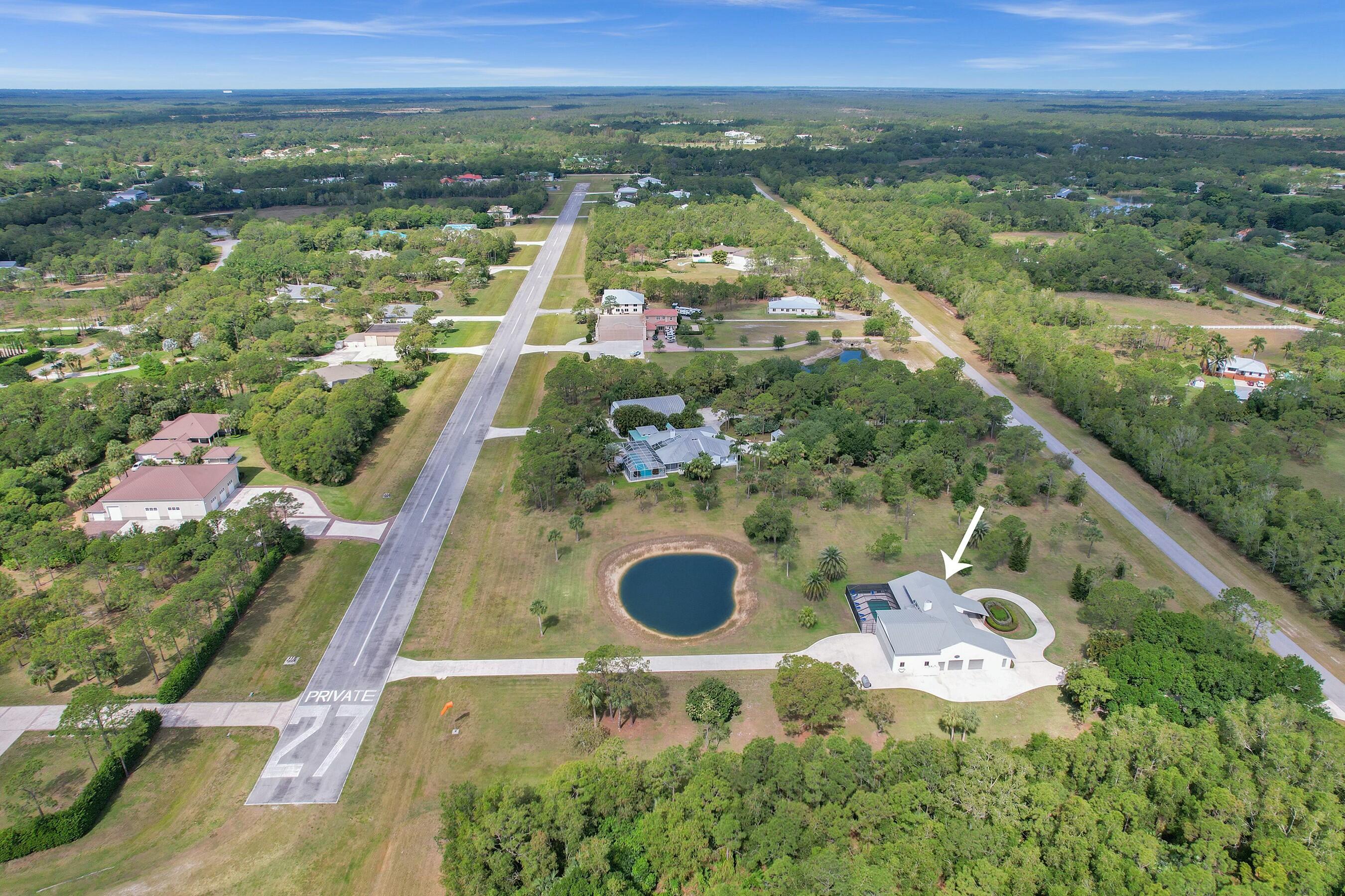 3120 Southeast Downwinds Road Jupiter, FL 33478 - Photo 5 of 33 a view of a city and mountains