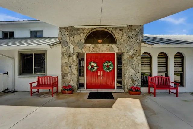a front view of a house with outdoor space