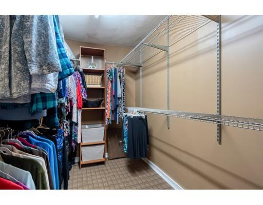55 Norris Road Tyngsborough, MA 01879 - Photo 18 of 29 a view of walk in closet with clothes and shoes