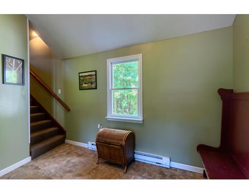 55 Norris Road Tyngsborough, MA 01879 - Photo 24 of 29 a room with furniture and a window