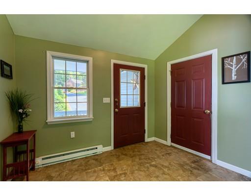 55 Norris Road Tyngsborough, MA 01879 - Photo 25 of 29 a room with two windows and a dresser