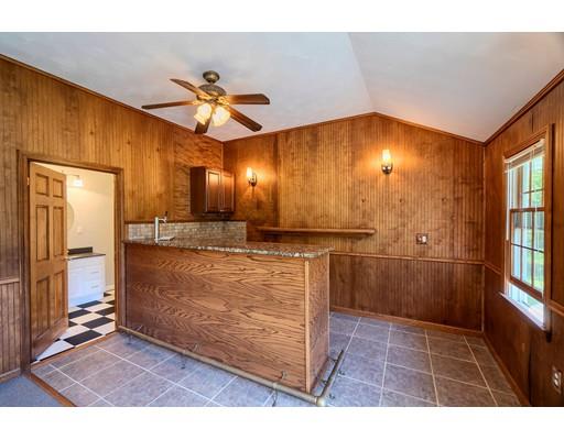 55 Norris Road Tyngsborough, MA 01879 - Photo 28 of 29 a view of a livingroom with a kitchen