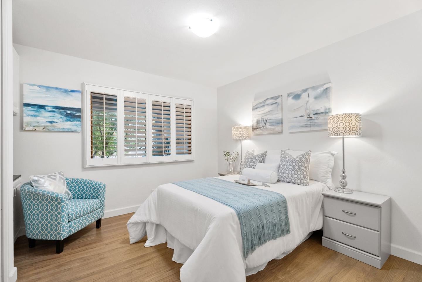 1081 Rockefeller Drive Sunnyvale, CA 94087 - Photo 13 of 24 a bedroom with a bed and a window