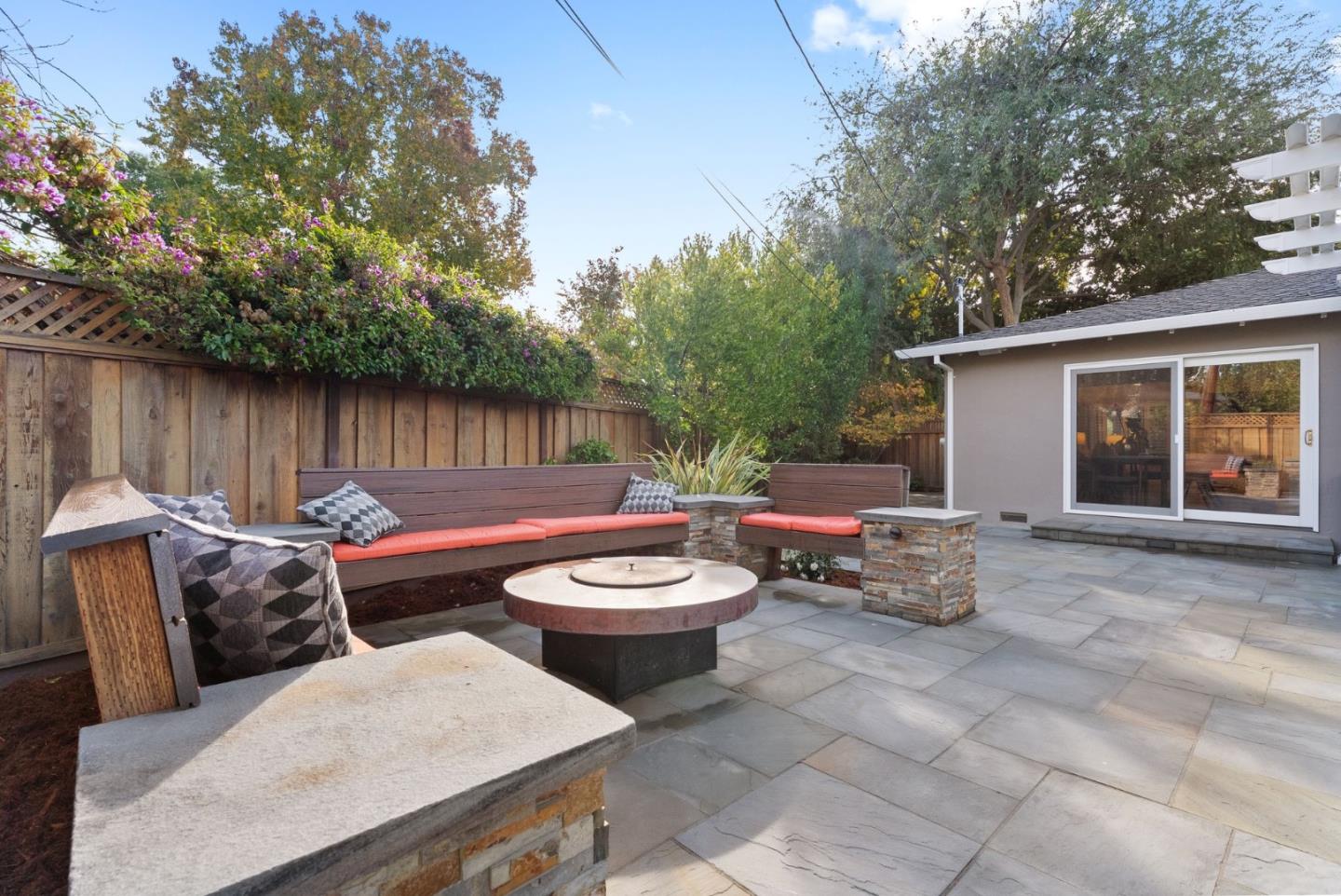 1081 Rockefeller Drive Sunnyvale, CA 94087 - Photo 19 of 24 a backyard of a house with fire pit and outdoor seating