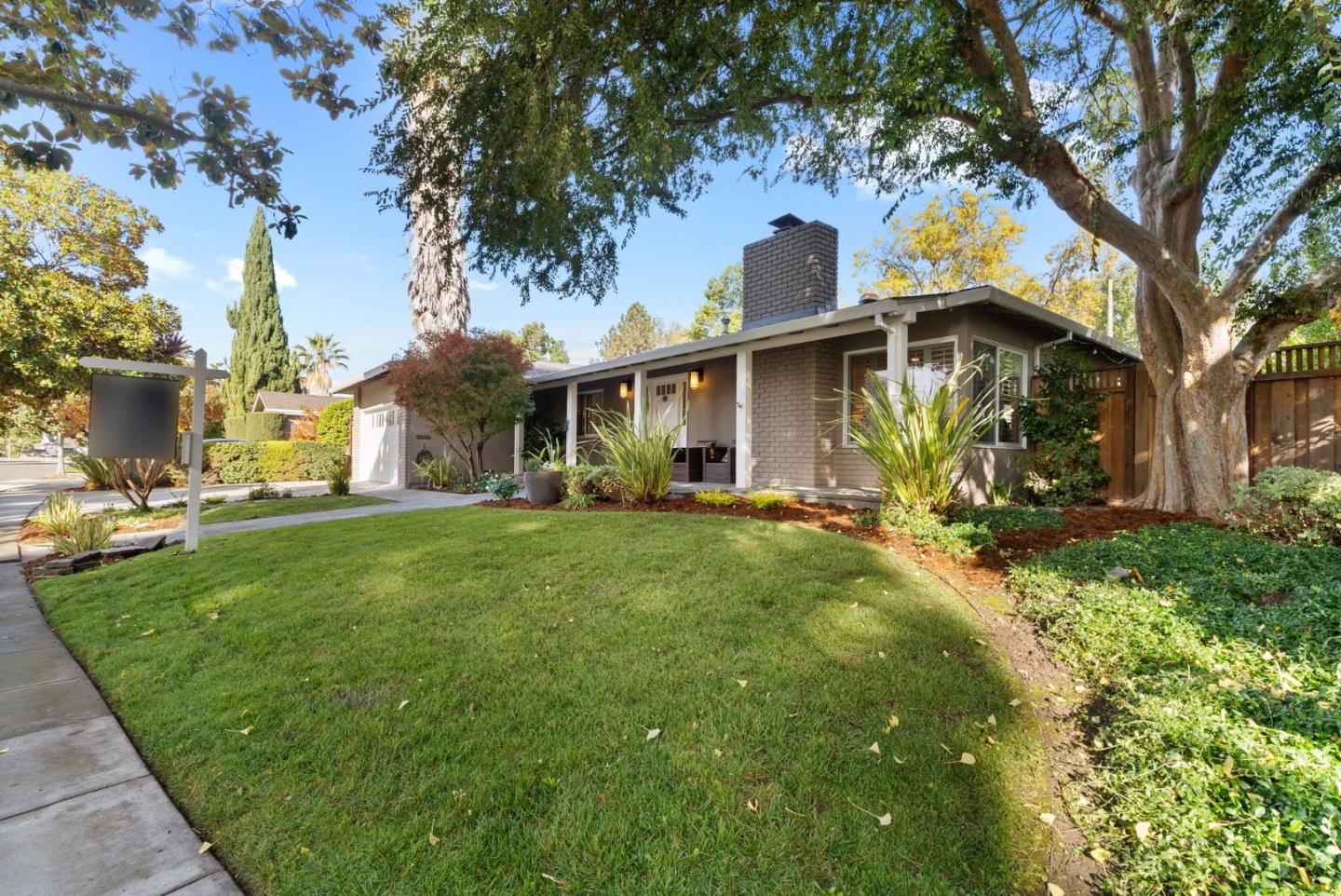 1081 Rockefeller Drive Sunnyvale, CA 94087 - Photo 3 of 24 a front view of house with yard and green space