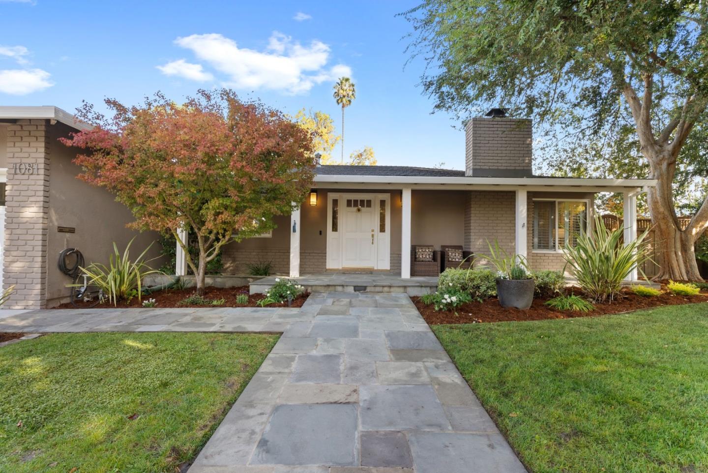 1081 Rockefeller Drive Sunnyvale, CA 94087 - Photo 4 of 24 a front view of a house with a yard and potted plants