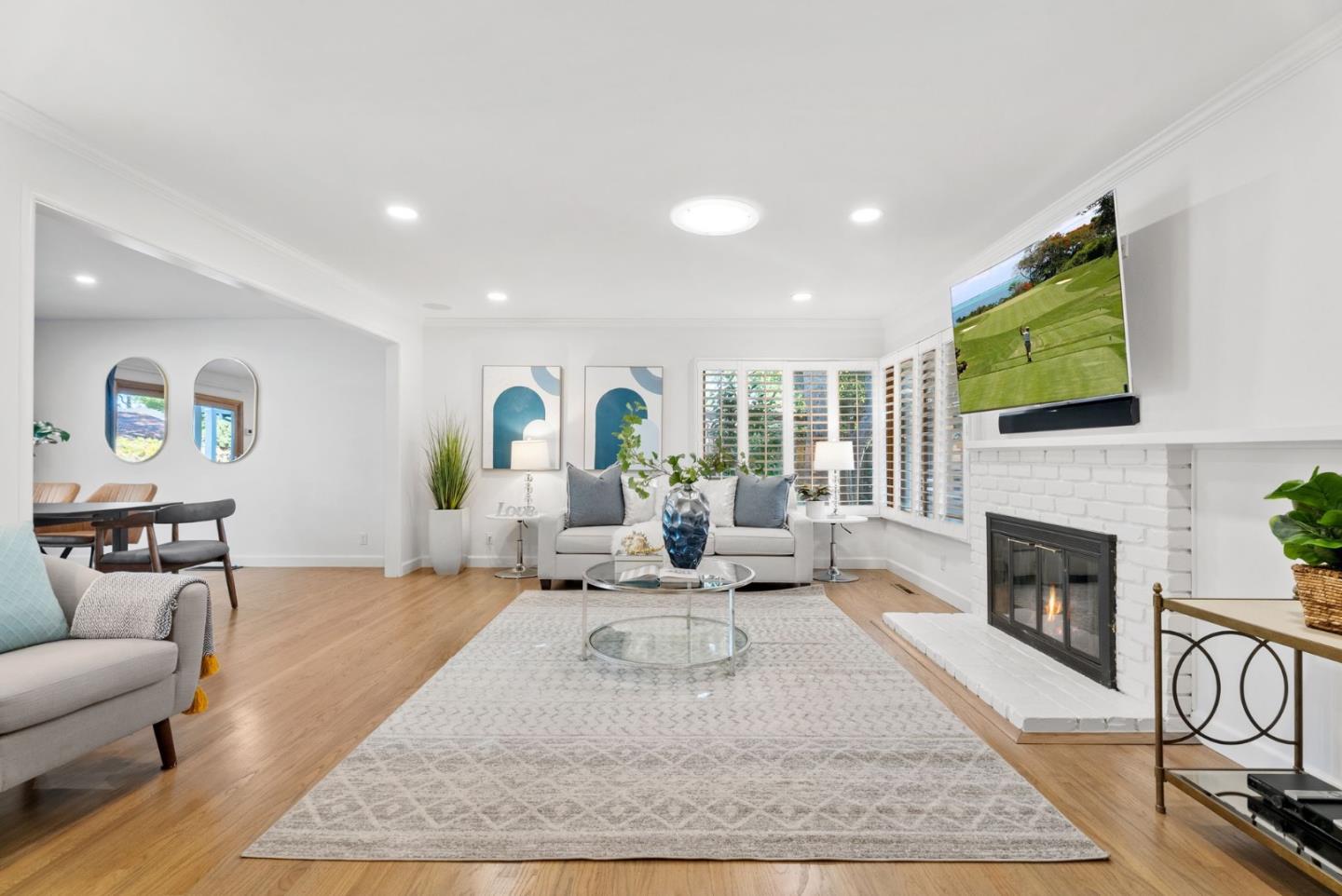 1081 Rockefeller Drive Sunnyvale, CA 94087 - Photo 5 of 24 a living room with furniture fireplace and window