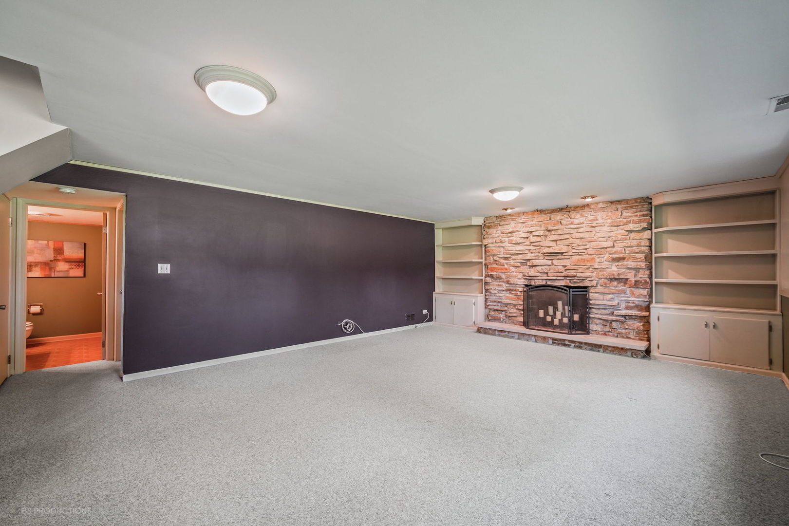 416 Green Valley Drive Naperville, IL 60540 - Photo 14 of 27 a view of an empty room with a fireplace