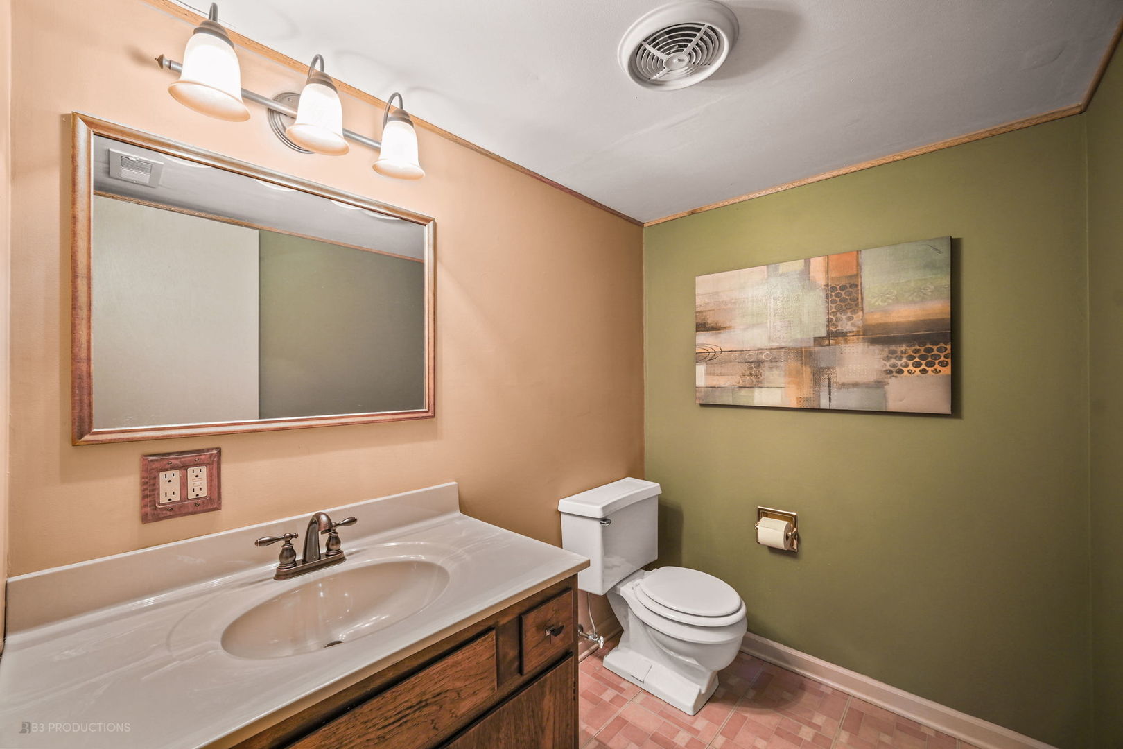 416 Green Valley Drive Naperville, IL 60540 - Photo 15 of 27 a bathroom with a sink mirror vanity and toilet