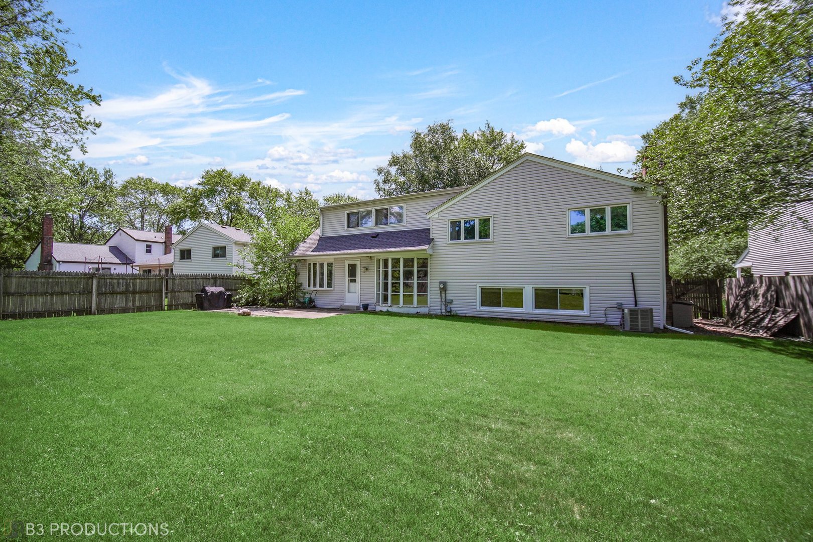 416 Green Valley Drive Naperville, IL 60540 - Photo 25 of 27 a view of a house with backyard and garden