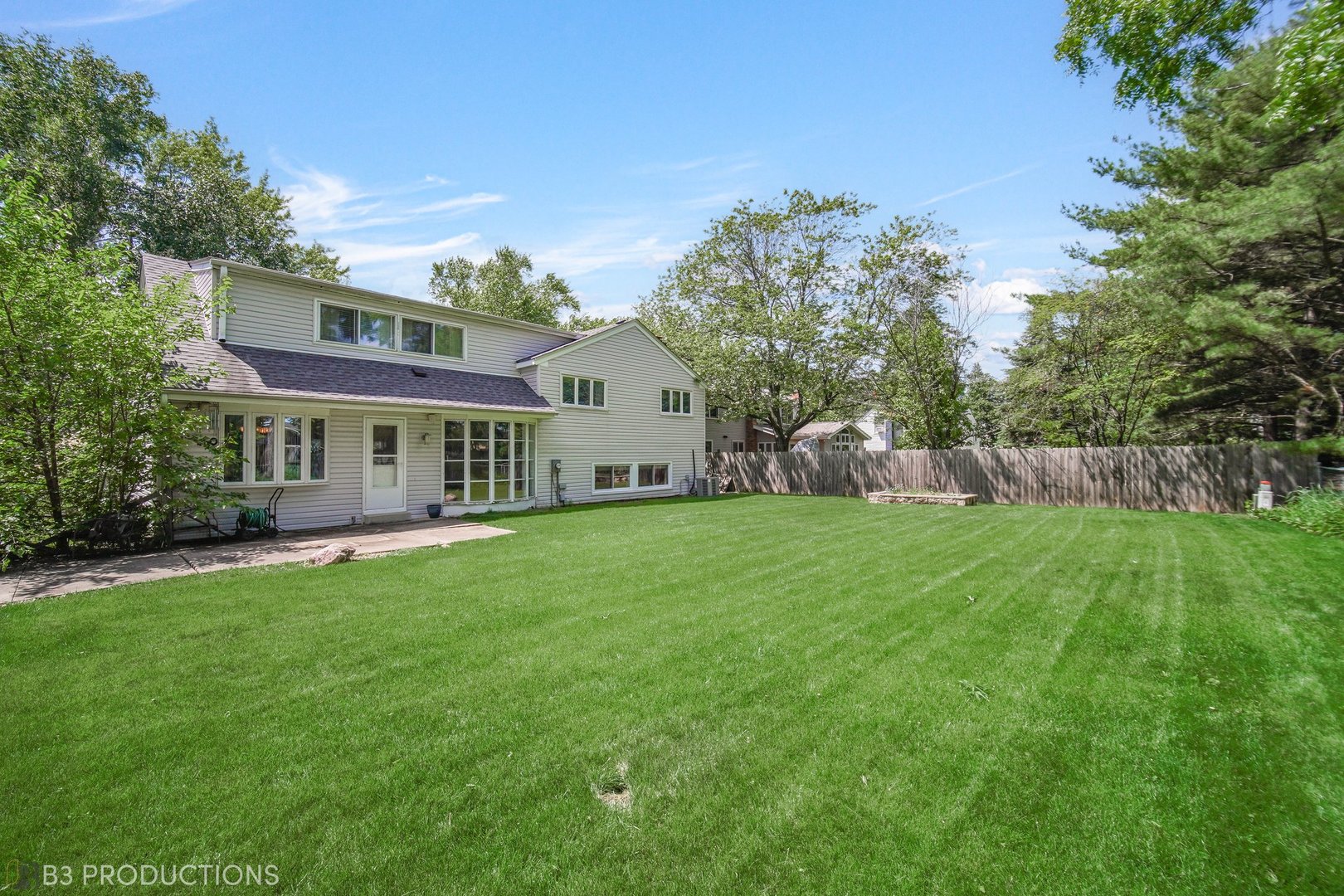416 Green Valley Drive Naperville, IL 60540 - Photo 27 of 27 a front view of house with yard and green space