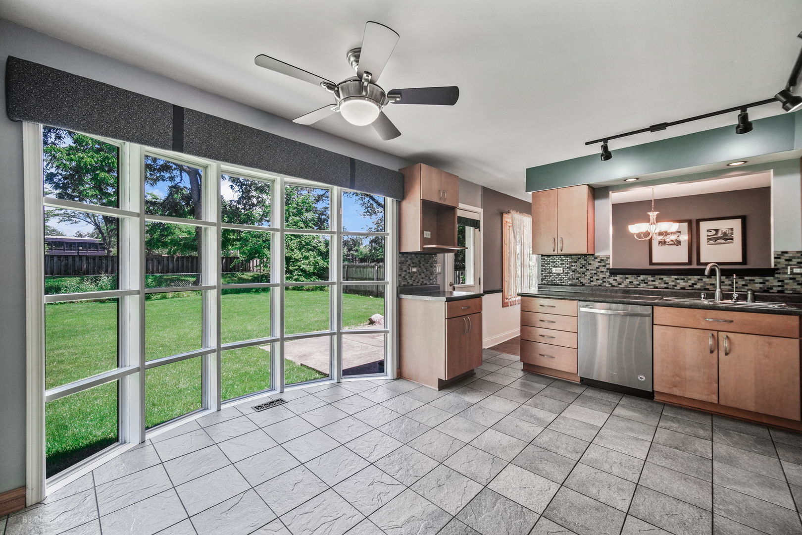 416 Green Valley Drive Naperville, IL 60540 - Photo 8 of 27 a kitchen with stainless steel appliances granite countertop a refrigerator and a sink