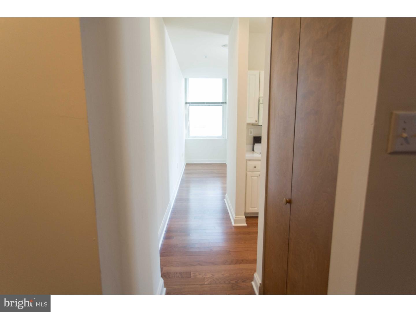 1600-3 Walnut Street, Unit 902 Philadelphia, PA 19103 - Photo 14 of 25 a view of an empty room and wooden floor