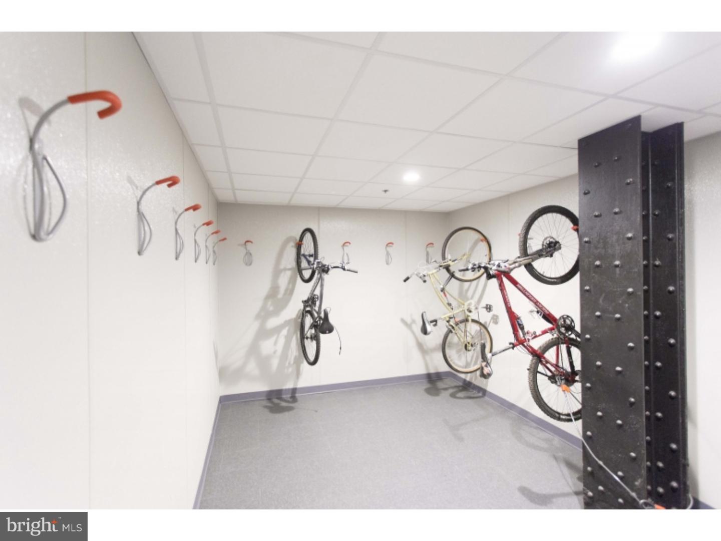 1600-3 Walnut Street, Unit 902 Philadelphia, PA 19103 - Photo 5 of 25 a view of a room with gym equipment