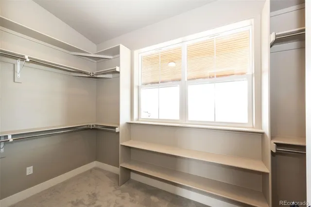 a view of walk in closet with window