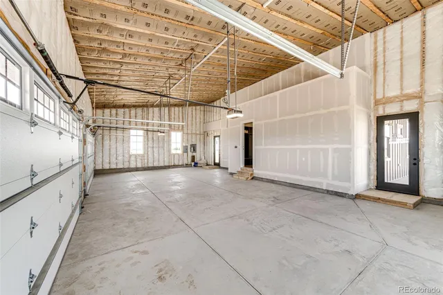 a view of a hallway with staircase