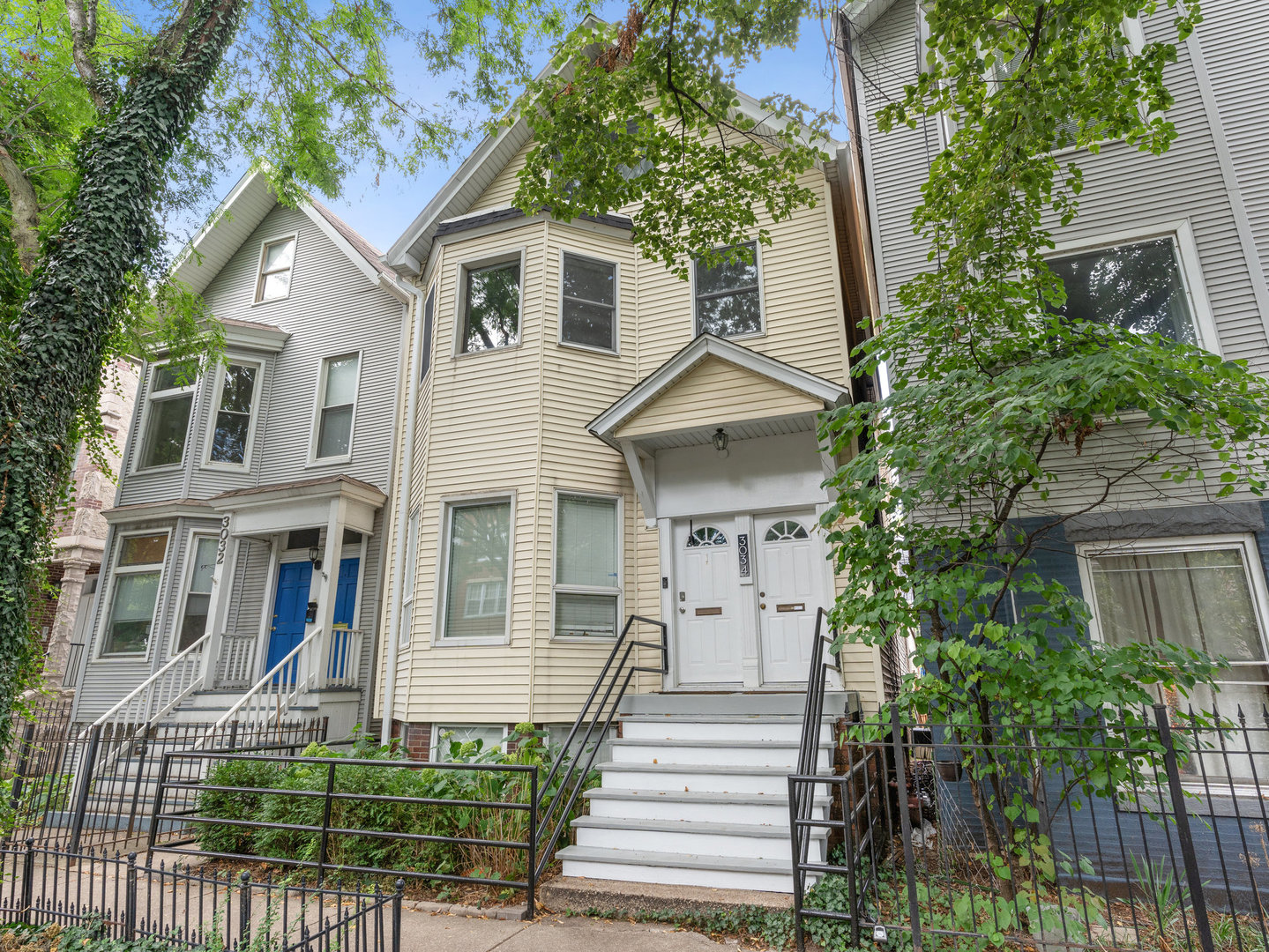 3034 North Seminary Avenue, Unit 2 Chicago, IL 60657 - Photo 2 of 26 a front view of a house with a garden