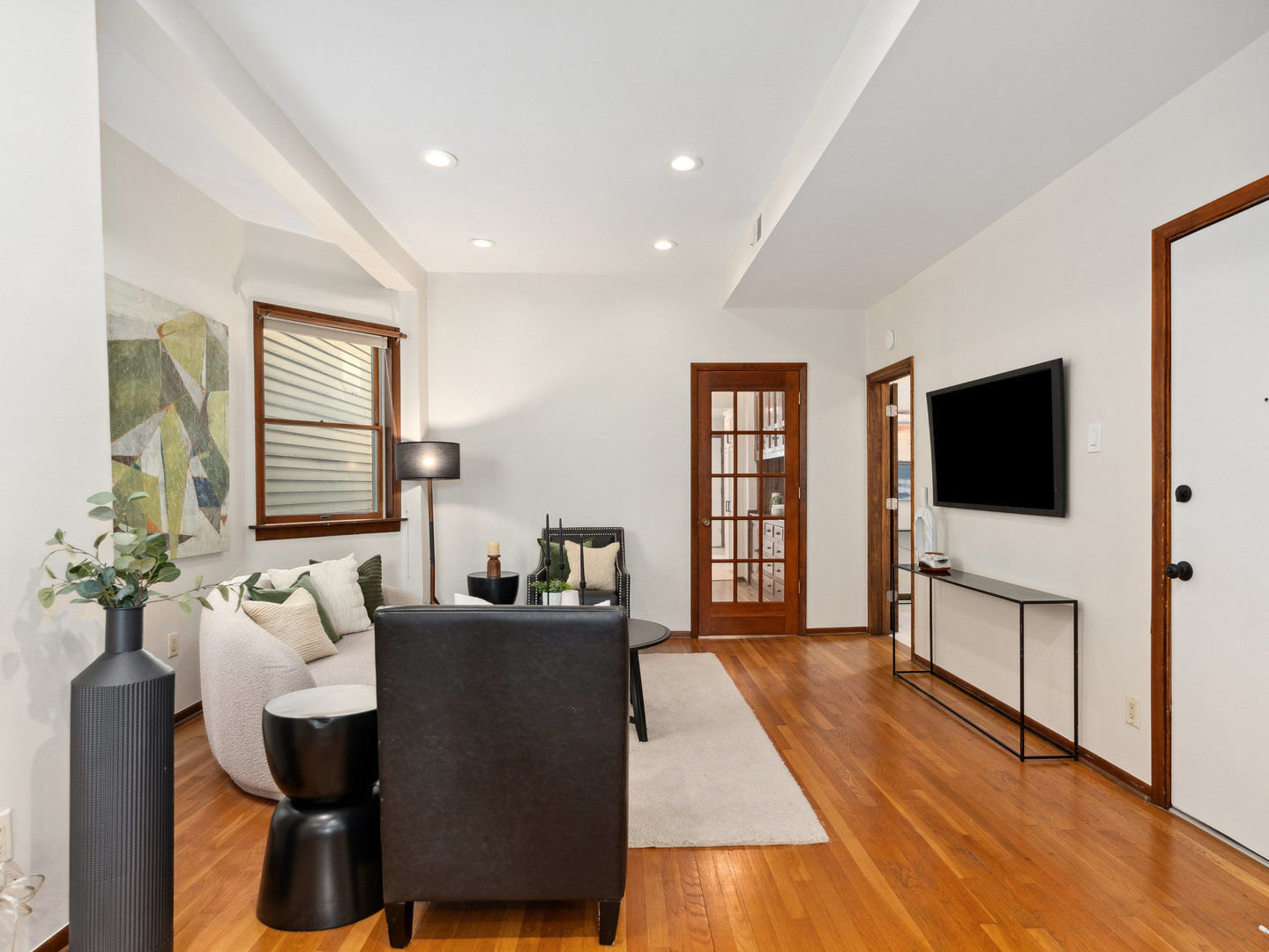 3034 North Seminary Avenue, Unit 2 Chicago, IL 60657 - Photo 6 of 26 a living room with furniture fireplace and flat screen tv
