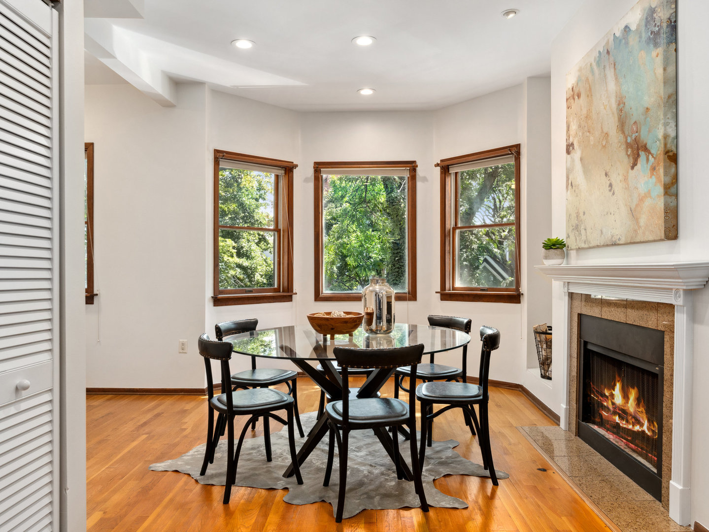 3034 North Seminary Avenue, Unit 2 Chicago, IL 60657 - Photo 10 of 26 a view of a dining room with furniture window and outside view
