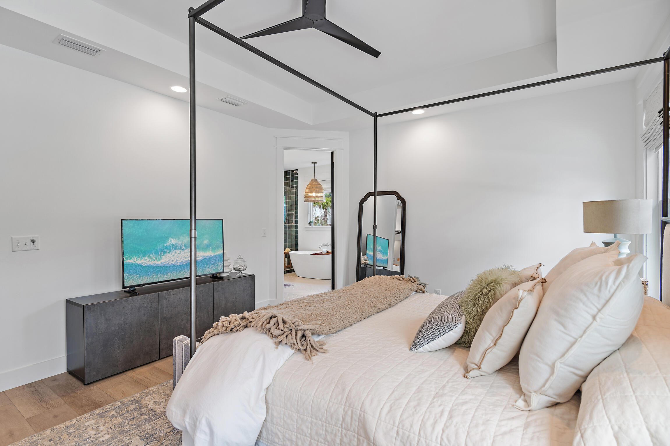 515 Hideaway Circle Santa Rosa Beach, FL 32459 - Photo 21 of 58 a bedroom with a bed and a mirror