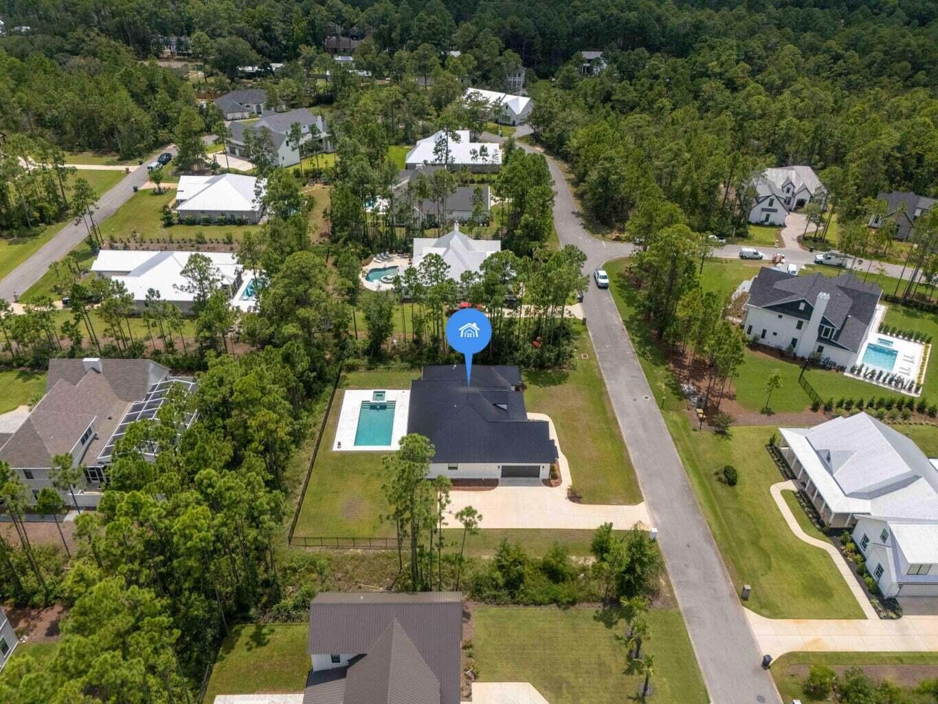 515 Hideaway Circle Santa Rosa Beach, FL 32459 - Photo 50 of 58 an aerial view of a house with a swimming pool