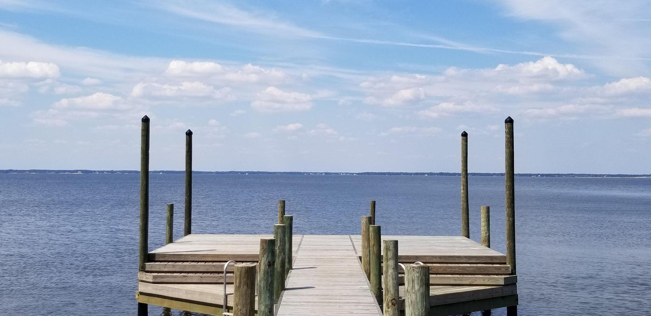 515 Hideaway Circle Santa Rosa Beach, FL 32459 - Photo 52 of 58 a view of a terrace with chairs