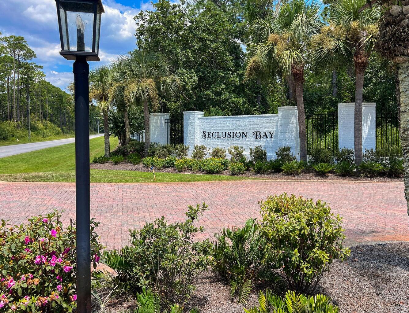 515 Hideaway Circle Santa Rosa Beach, FL 32459 - Photo 53 of 58 a front view of a house with garden