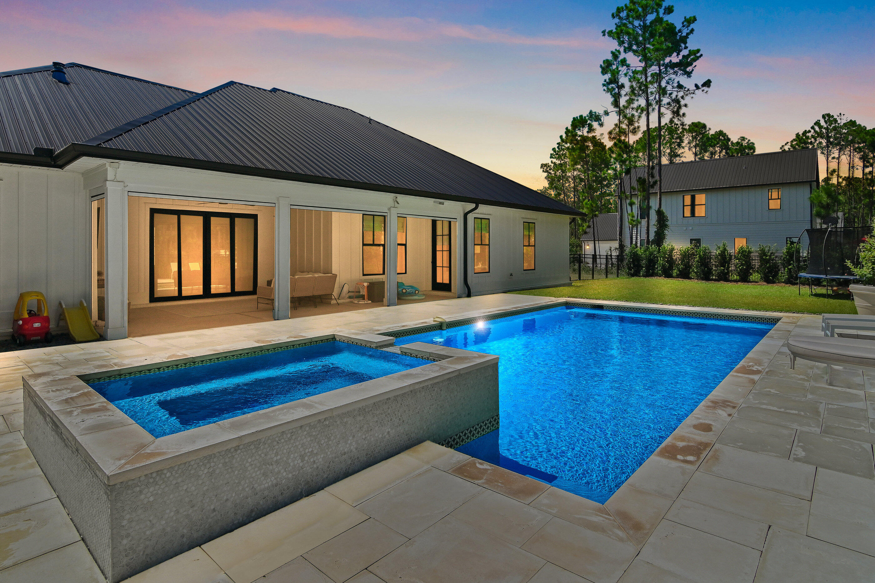 515 Hideaway Circle Santa Rosa Beach, FL 32459 - Photo 56 of 58 a view of swimming pool with lawn chairs under an umbrella
